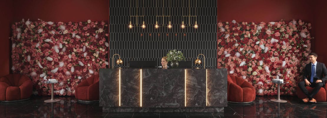 Hotel reception with flowerwall
